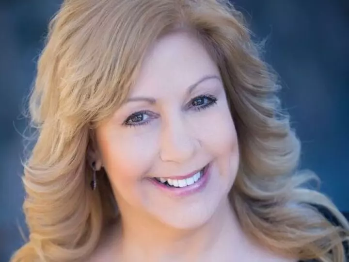 A Headshot Of Judy C